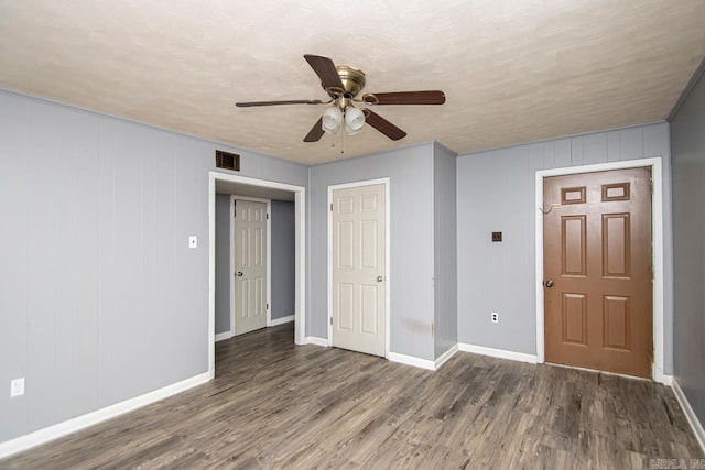 1400 S Rose St, Sheridan, AR 72150 - interior space featuring baseboards, ceiling fan, visible vents, and wood finished floors