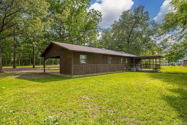 1400 S Rose St, Sheridan, AR 72150 - exterior space featuring a yard and a carport