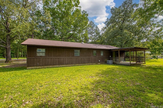 1400 S Rose St, Sheridan, AR 72150 - back of property with a yard and central AC