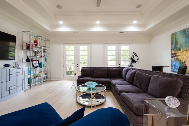 44 Deauville Cir, Little Rock, AR 72223 - living room with french doors, a tray ceiling, crown molding, light wood-type flooring, and recessed lighting
