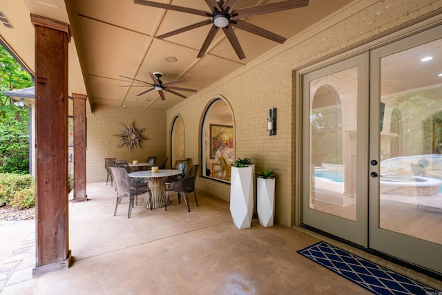 44 Deauville Cir, Little Rock, AR 72223 - view of patio / terrace with a ceiling fan, outdoor dining space, french doors, and visible vents