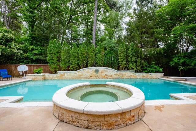 44 Deauville Cir, Little Rock, AR 72223 - view of pool with a diving board, a pool with connected hot tub, fence, and a patio area