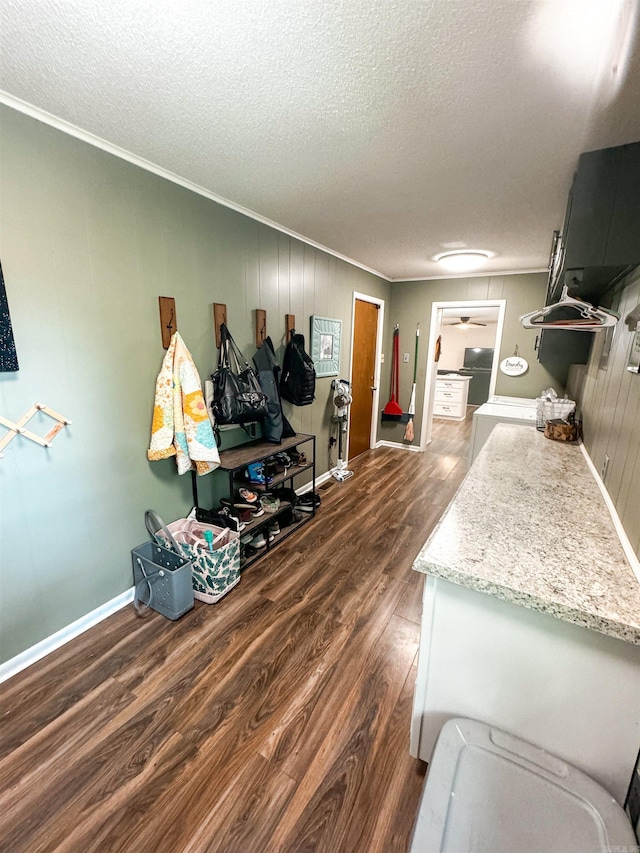 105 Liles, Searcy, AR 72143 - interior space with crown molding, a textured ceiling, and dark wood-style flooring