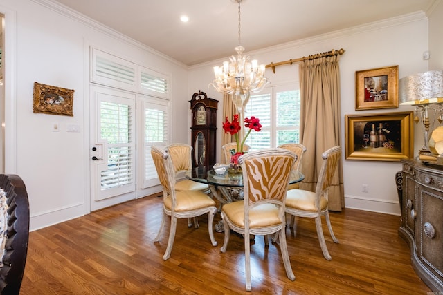 102 Falata Cir, Little Rock, AR 72223 - dining space with crown molding, a notable chandelier, baseboards, and wood finished floors