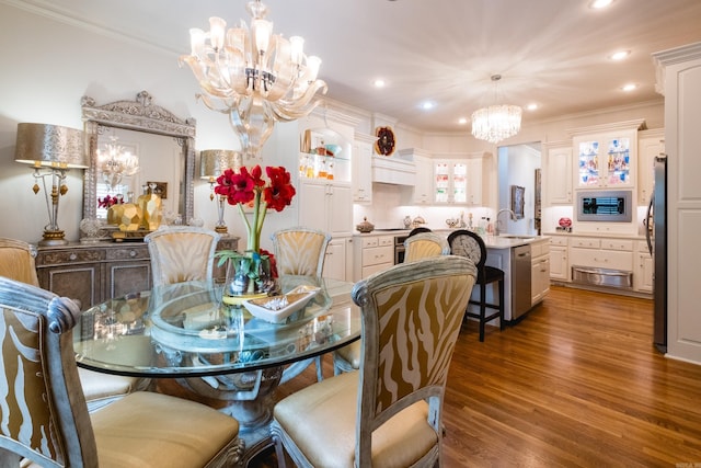 102 Falata Cir, Little Rock, AR 72223 - dining room with an inviting chandelier, wood finished floors, ornamental molding, and recessed lighting