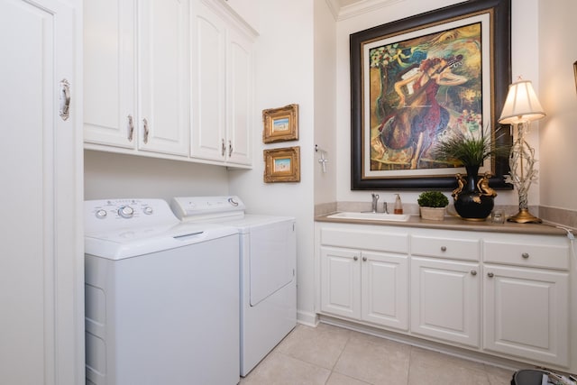 102 Falata Cir, Little Rock, AR 72223 - washroom with independent washer and dryer, a sink, light tile patterned flooring, and cabinet space