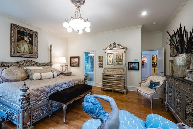 102 Falata Cir, Little Rock, AR 72223 - bedroom featuring crown molding, ensuite bath, wood finished floors, and a notable chandelier