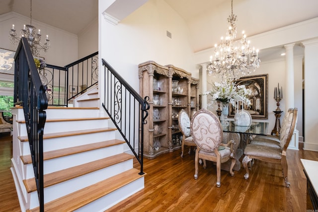 102 Falata Cir, Little Rock, AR 72223 - dining space featuring stairs, a chandelier, and wood finished floors