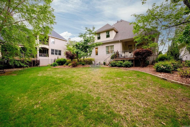 102 Falata Cir, Little Rock, AR 72223 - rear view of property with a yard and fence