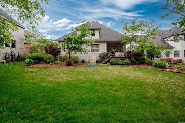 102 Falata Cir, Little Rock, AR 72223 - back of house featuring a lawn, stairs, ceiling fan, and fence