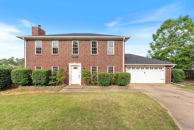 122 Apple Blossom Loop, Maumelle, AR 72113 - colonial-style house featuring a front lawn, driveway, a chimney, and an attached garage