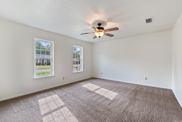 122 Apple Blossom Loop, Maumelle, AR 72113 - carpeted spare room with a textured ceiling, baseboards, a ceiling fan, and visible vents