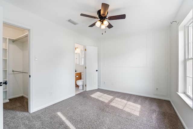 122 Apple Blossom Loop, Maumelle, AR 72113 - unfurnished bedroom featuring carpet, ensuite bathroom, baseboards, and visible vents