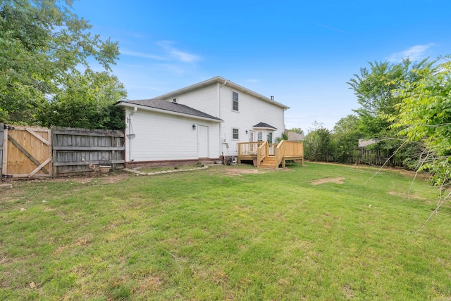 122 Apple Blossom Loop, Maumelle, AR 72113 - back of property with a yard, fence, a wooden deck, and a gate