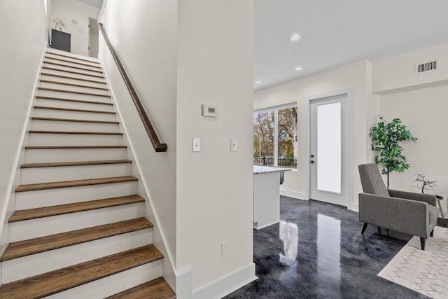 920 Park St, Little Rock, AR 72202 - stairs with finished concrete flooring, visible vents, baseboards, and recessed lighting