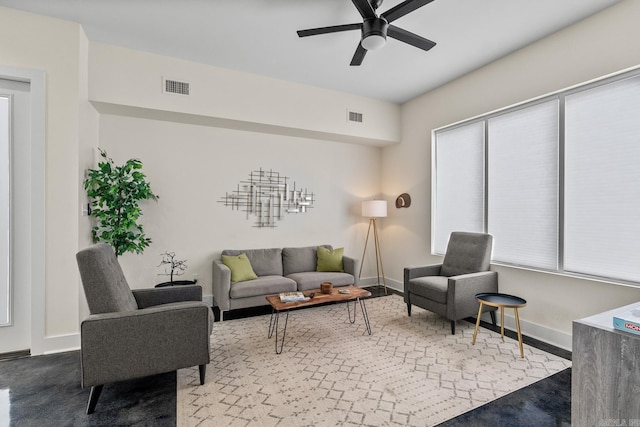 920 Park St, Little Rock, AR 72202 - living area featuring baseboards, a ceiling fan, and visible vents