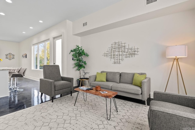 920 Park St, Little Rock, AR 72202 - living room featuring visible vents, wood finished floors, baseboards, and recessed lighting