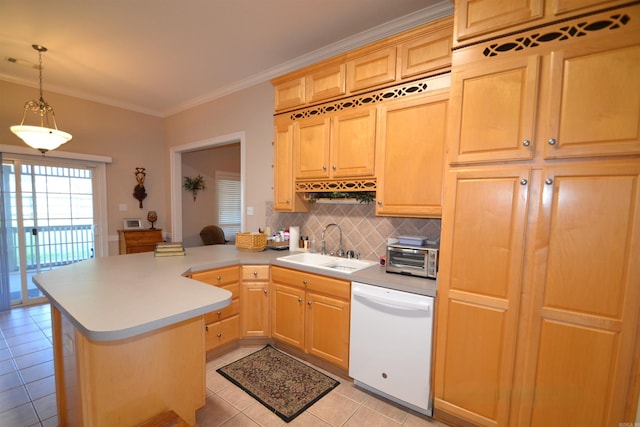 3810 Hanover Dr, Bryant, AR 72022 - kitchen featuring a sink, a peninsula, tasteful backsplash, light tile patterned flooring, and white dishwasher