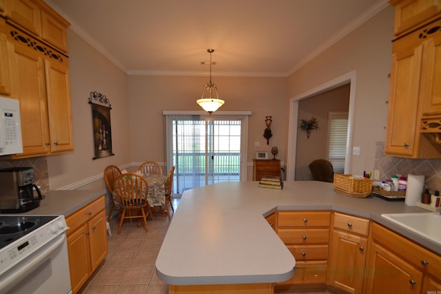 3810 Hanover Dr, Bryant, AR 72022 - kitchen featuring a peninsula, white appliances, decorative backsplash, and light countertops