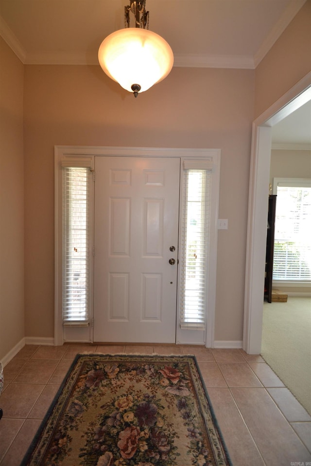 3810 Hanover Dr, Bryant, AR 72022 - entryway with ornamental molding, baseboards, and light tile patterned floors