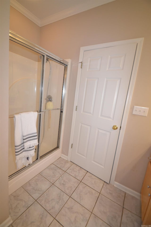 3810 Hanover Dr, Bryant, AR 72022 - full bathroom featuring a stall shower, ornamental molding, and baseboards