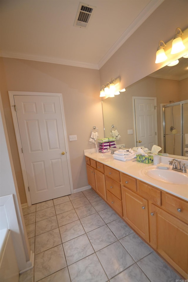 3810 Hanover Dr, Bryant, AR 72022 - full bathroom featuring ornamental molding, visible vents, a sink, a shower stall, and tile patterned flooring