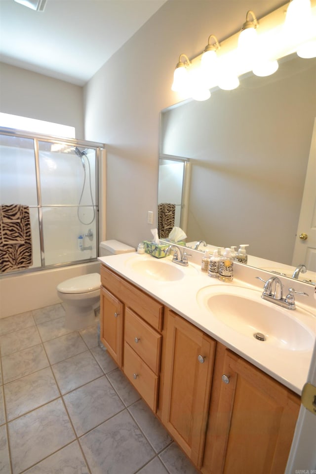 3810 Hanover Dr, Bryant, AR 72022 - full bath featuring a sink, double vanity, combined bath / shower with glass door, and tile patterned floors
