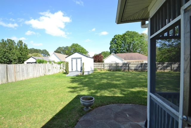 3810 Hanover Dr, Bryant, AR 72022 - view of yard with a fenced backyard, an outdoor structure, and a storage shed