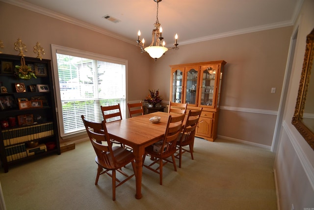 3810 Hanover Dr, Bryant, AR 72022 - dining room with light carpet, crown molding, an inviting chandelier, and visible vents