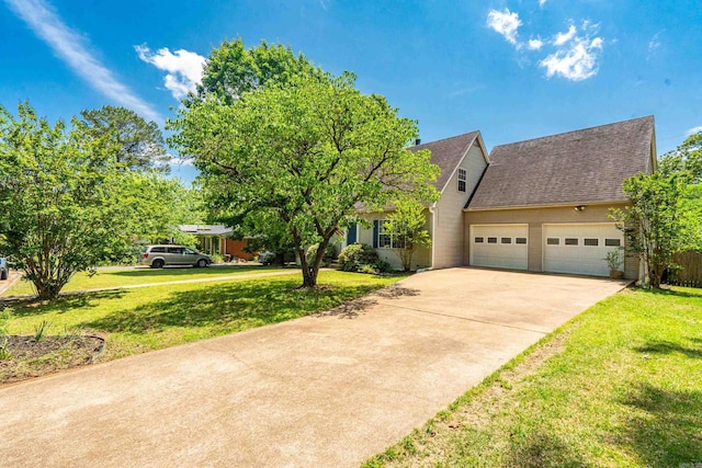 330 Melwood St, Hot Springs National Park, AR 71901 - view of front facade with concrete driveway, a front yard, a shingled roof, and a garage