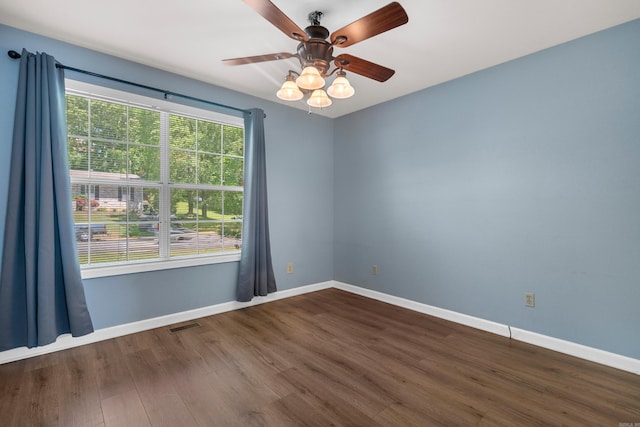 330 Melwood St, Hot Springs National Park, AR 71901 - empty room featuring baseboards, ceiling fan, and dark wood-style floors