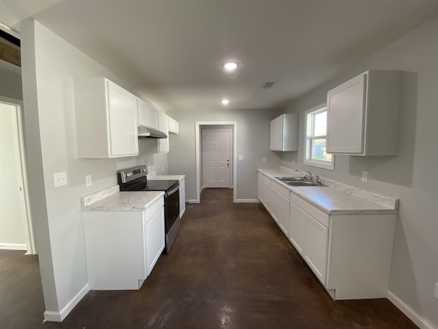 kitchen with under cabinet range hood, baseboards, visible vents, a sink, and stainless steel electric stove