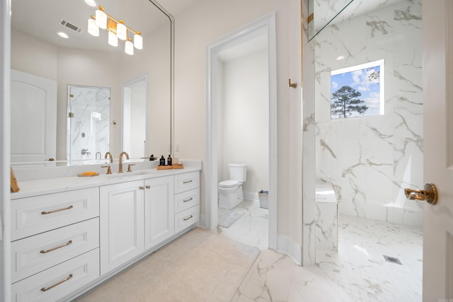 bathroom with toilet, marble finish floor, vanity, a marble finish shower, and visible vents