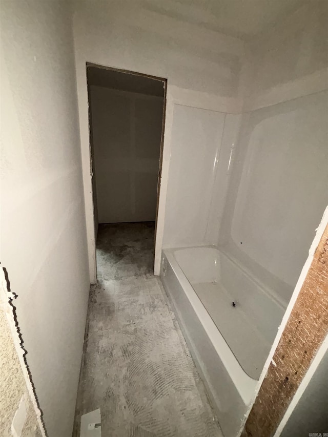 bathroom with a tub