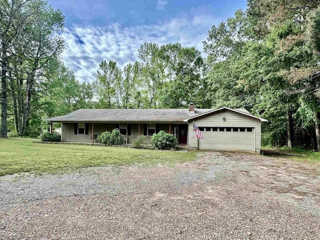 12921 Barth Rd, Alexander, AR 72002 - ranch-style house featuring driveway, an attached garage, a front lawn, and a chimney