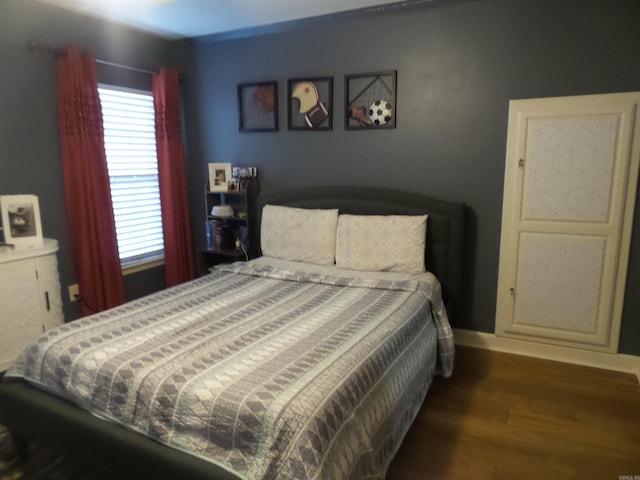 2808 Valley Park, Little Rock, AR 72212 - bedroom featuring baseboards and wood finished floors