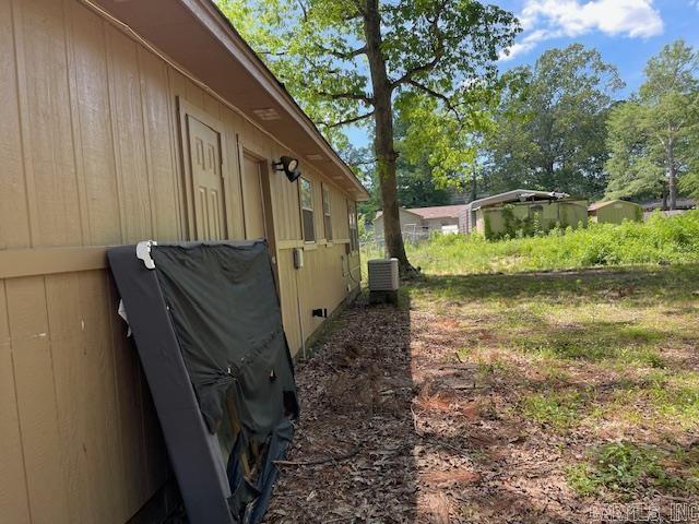 view of home's exterior featuring central AC unit