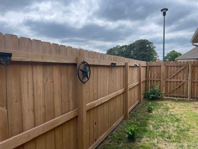 2241 Sage Meadows Cir, Sherwood, AR 72120 - view of yard featuring fence