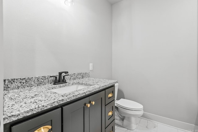 54 Lieblong Rd, Greenbrier, AR 72058 - bathroom with toilet, baseboards, marble finish floor, and vanity