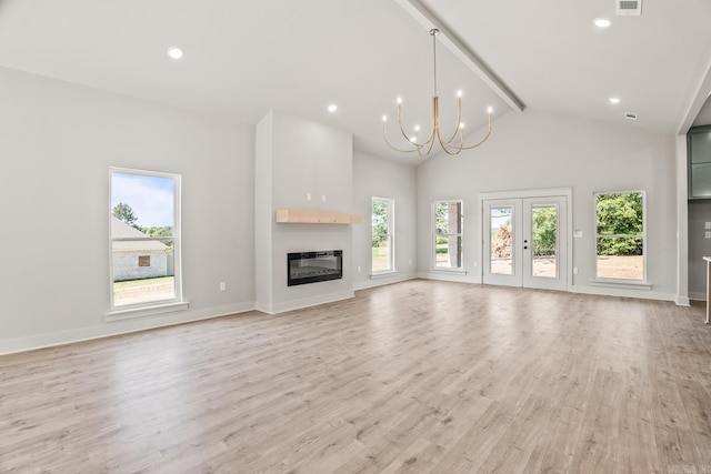 54 Lieblong Rd, Greenbrier, AR 72058 - unfurnished living room with a notable chandelier, beam ceiling, plenty of natural light, and high vaulted ceiling