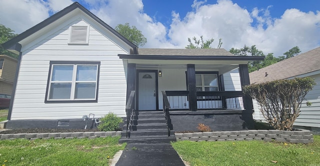 2720 S Spring St, Little Rock, AR 72206 - bungalow-style home featuring a front lawn and covered porch