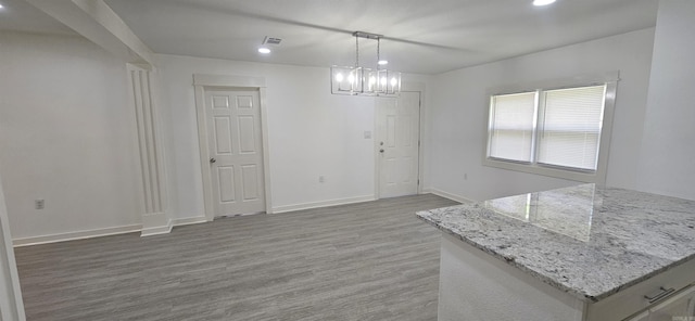 2720 S Spring St, Little Rock, AR 72206 - unfurnished dining area featuring a chandelier, wood finished floors, baseboards, and recessed lighting
