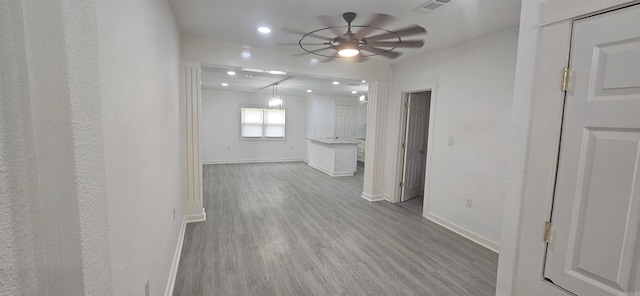 2720 S Spring St, Little Rock, AR 72206 - empty room featuring wood finished floors, visible vents, recessed lighting, a ceiling fan, and baseboards