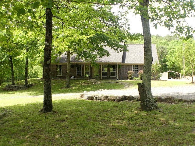 137 Gone Fishin Ln, Mena, AR 71953 - view of front of house with a front yard and brick siding