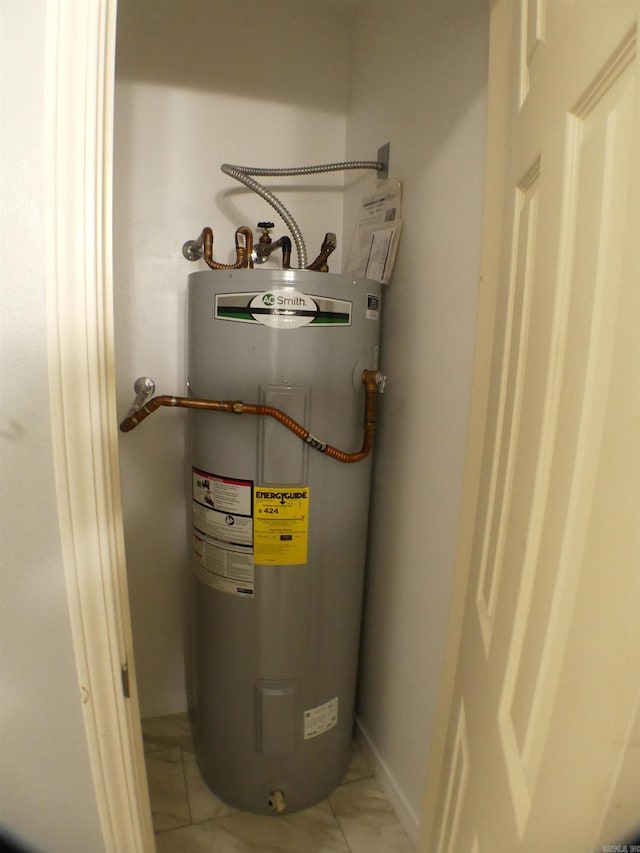 137 Gone Fishin Ln, Mena, AR 71953 - utility room featuring electric water heater