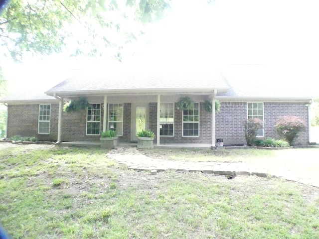 137 Gone Fishin Ln, Mena, AR 71953 - ranch-style home with brick siding and a porch