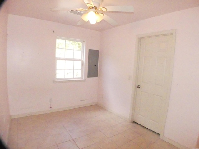137 Gone Fishin Ln, Mena, AR 71953 - spare room with electric panel, ceiling fan, light tile patterned flooring, and baseboards