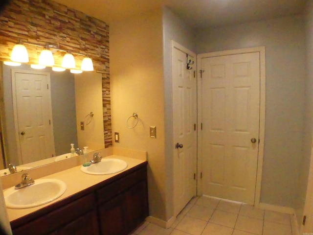 137 Gone Fishin Ln, Mena, AR 71953 - full bathroom with tile patterned flooring, double vanity, and baseboards