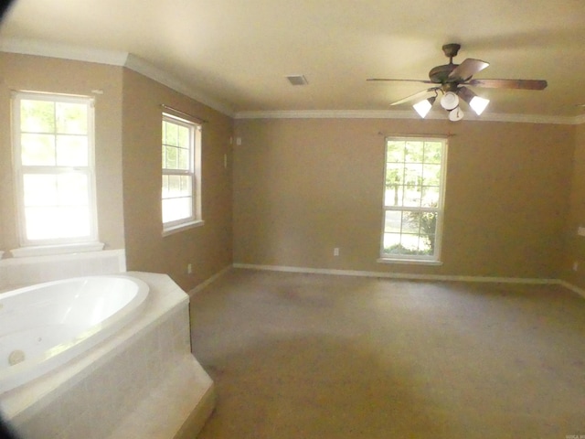 137 Gone Fishin Ln, Mena, AR 71953 - bathroom featuring crown molding, baseboards, plenty of natural light, a whirlpool tub, and ceiling fan