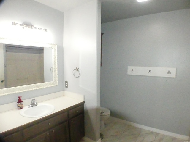 137 Gone Fishin Ln, Mena, AR 71953 - bathroom with vanity, toilet, and baseboards